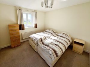 Bedroom One- click for photo gallery